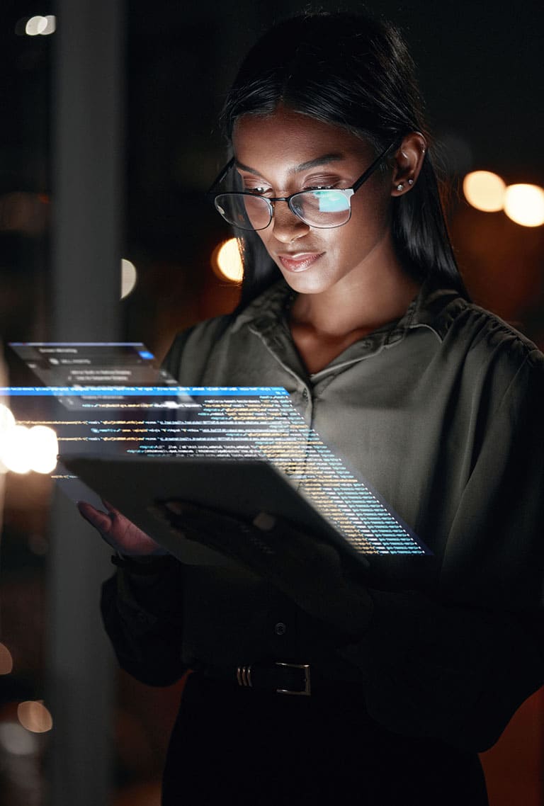 Photo of a female looking at a computer screen